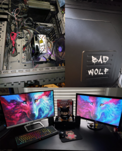 Image collage of a PC custom build. Top left image shows the inside of the case with cables and components, top right image shows the outside of the black case with a white sticker that reads "Bad Wolf," and the bottom image shows two monitors on a desktop with the same wolf painting in shades of pink and blue. 